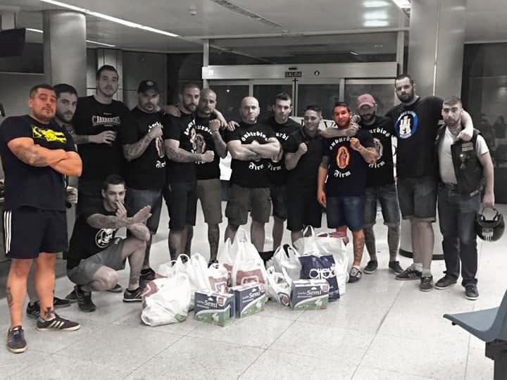 Miembros de Suburbios Firm recogiendo alimentos para Hogar Social Madrid